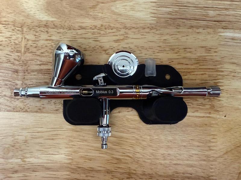 Wall-mounted airbrush holder