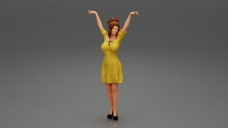Sexy young girl in a dress raised her hands up