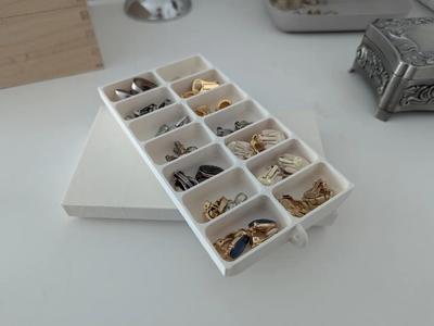 Earring container   