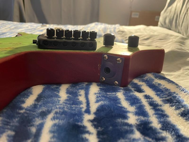 Electric guitar jack plate