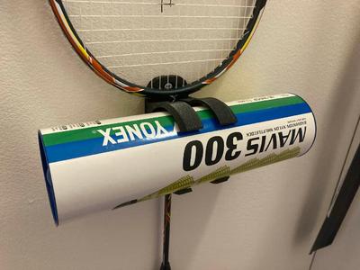 Badminton racket and shuttlecocks holder   