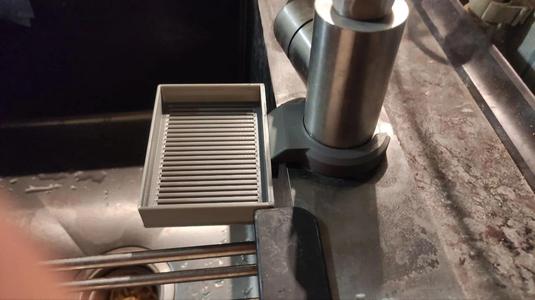 Sponge holder to faucet   