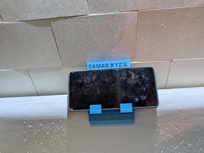 Phone holder for bath