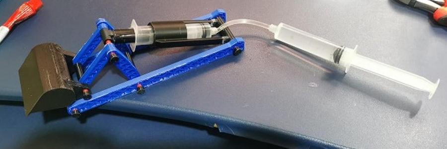 Hidraulic shovel with sringe