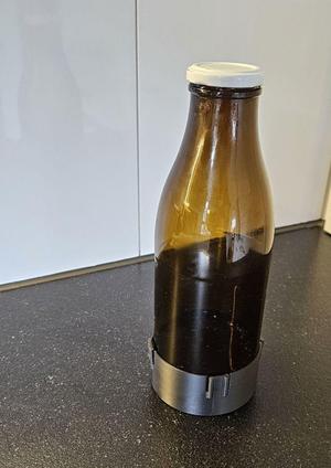 Milchflaschenuntersatz