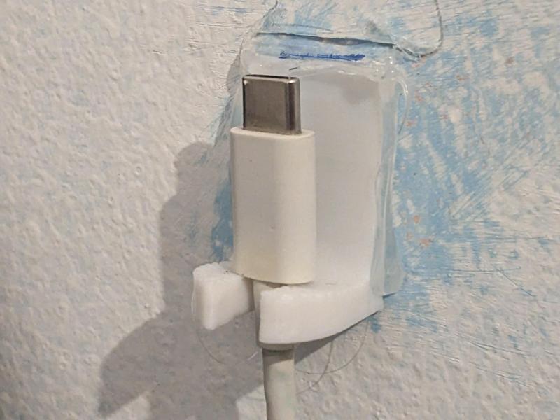 Wall cable holder