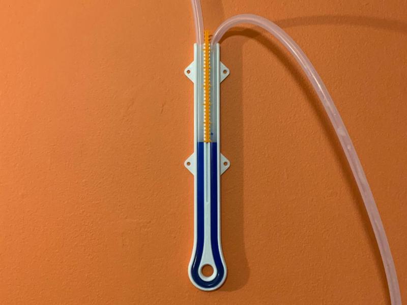 Water column manometer (measures low air pressure)