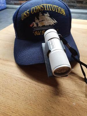 Flaschlight bracket with clip and for fixing belt