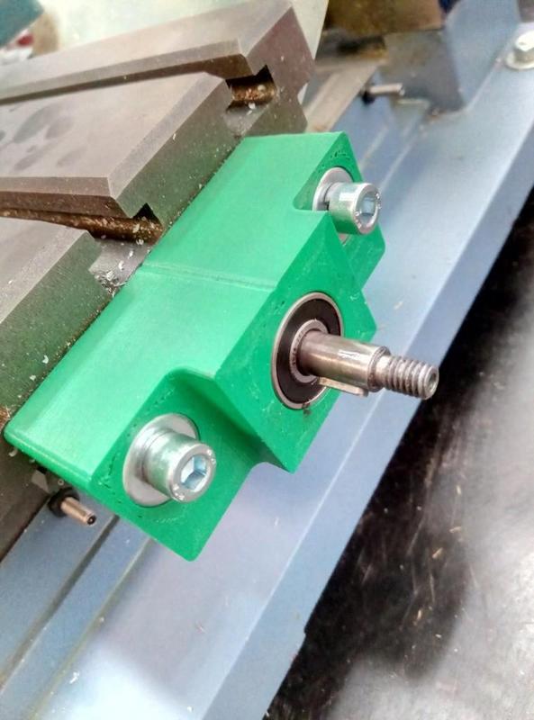Mill feedscrew bearing block