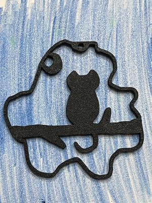 Cat on branch wall decoration