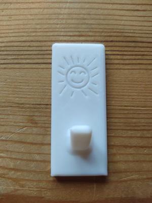 Towel holder with sun