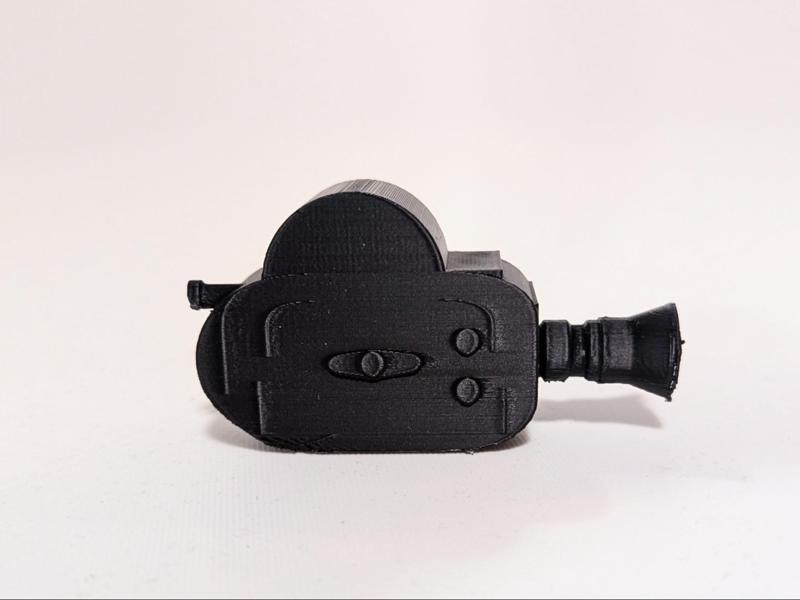 Miniature vintage analog 16mm film camera