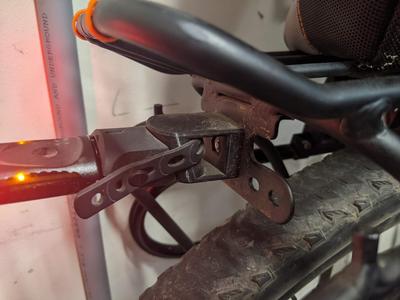 Bolt on holder for bicycle seatpost mounted lights