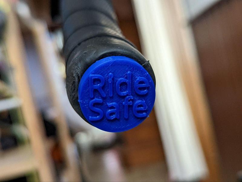 Bike handlebar end  plug "ride safe"