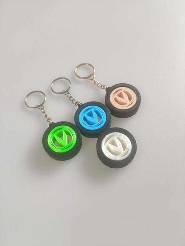 Changan Gyroscope Tire Keychain – Rotating Logo