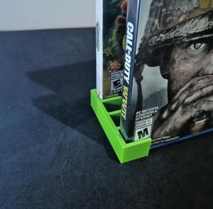 Holder for four PS4 disks (fast to print)