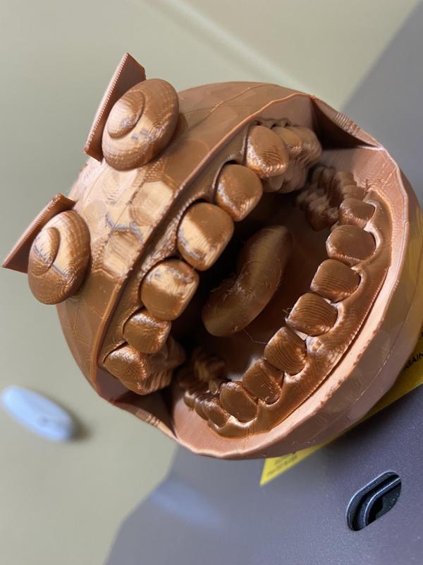 Biting Golf Ball Mascot