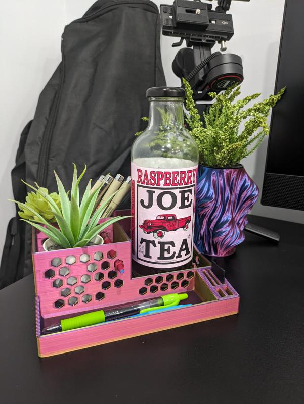 Desk organizer with slots for pens, sticky notes, usb thumb drives, SD cards, and more