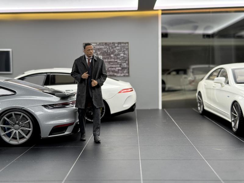 Men in suits and windbreakers 18