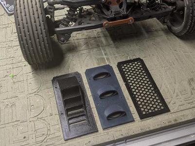 Baja 5th scale RC front window grills.
