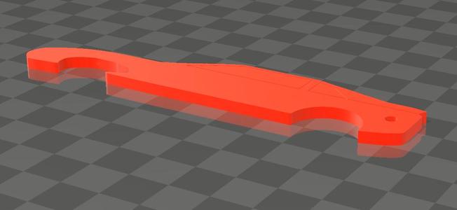 Key ring bottle opener in the shape of a car