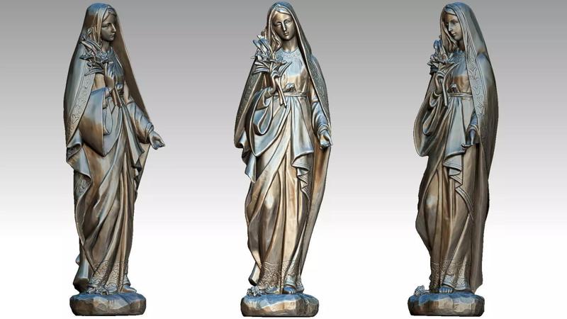 Virgin Mary holding flowers