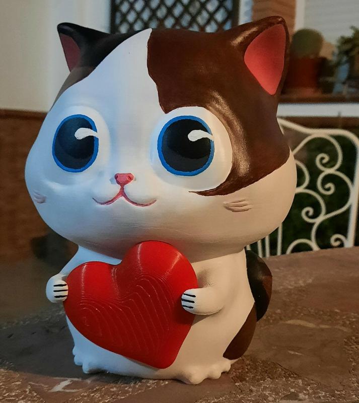 Valentine's Day Adorable kitty gives you her heart