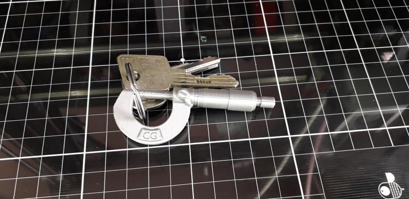 Micrometre key fob.