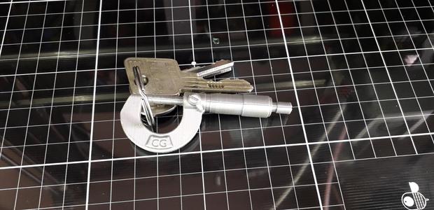 Micrometre key fob.