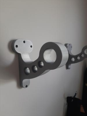 Motorcycle helmet holder