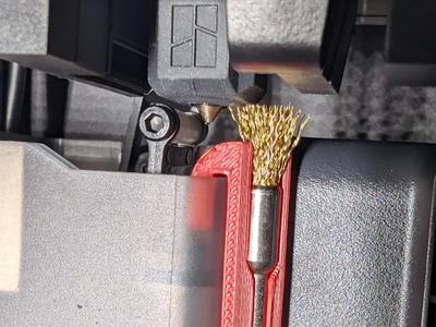 Nozzle wiper brush holder