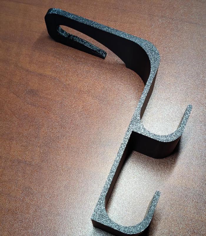 Universal Umbrella Hanger for a Vehicle