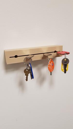 Wall-mounted key ring