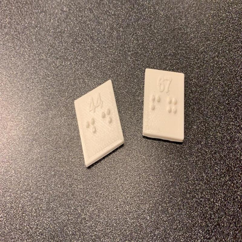 Braille bus notification buttons