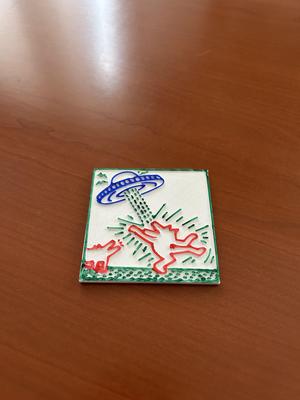 Coaster image by keith Haring