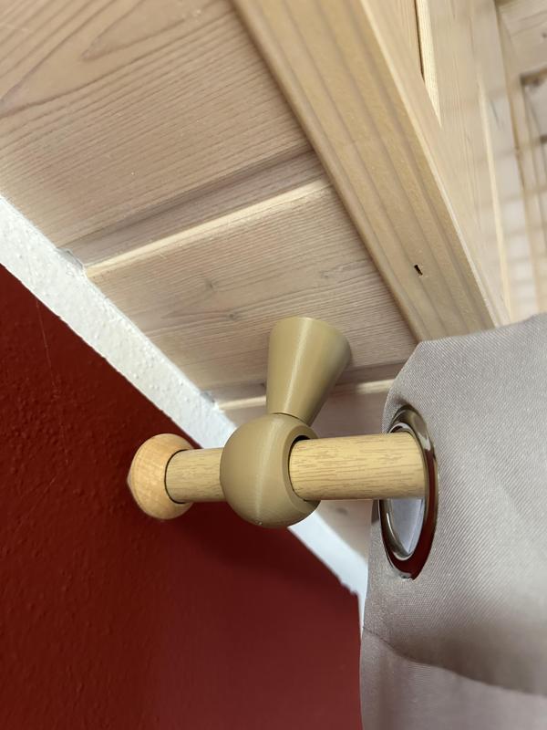 Curtain rod holder