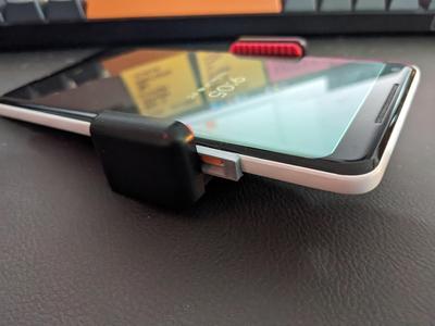 Google Pixel phone button protector for camera mount clamps