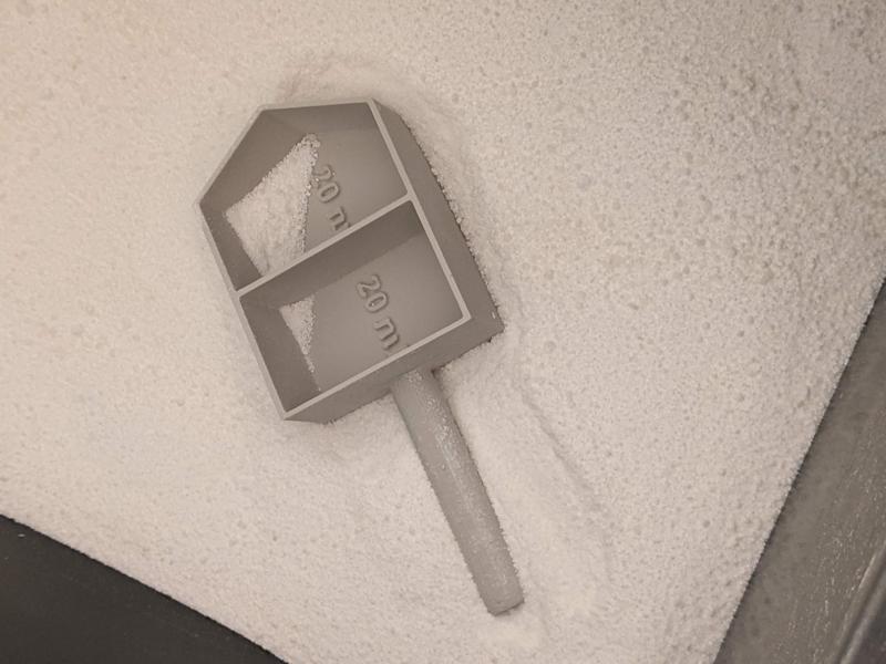 Detergent scoop with options for 20 plus 20 mL