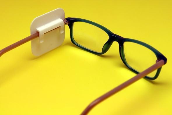 Side sun visor for the glasses (left)