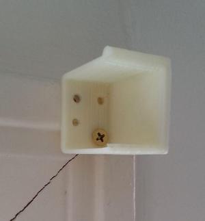 Mini-blind wall mounting bracket