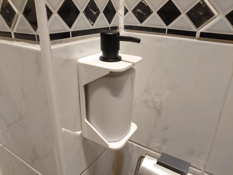 Soap dispenser wall bracket