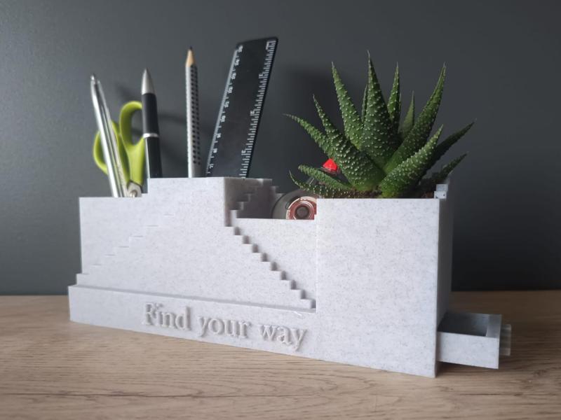 Organiser with a plant pot