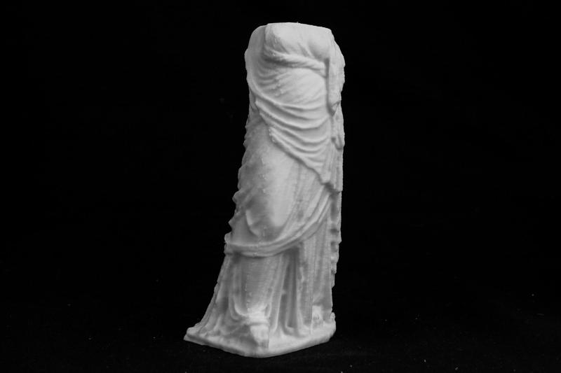 Elaborately Dressed Female Statue at The British Museum, London