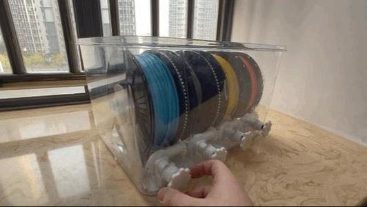 20L sealed enclosure filament spool holder with manual external rewind support