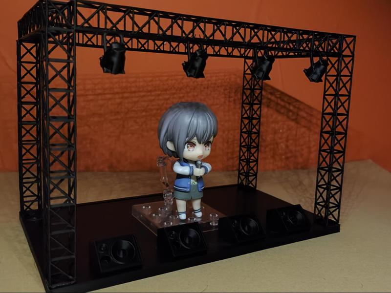 Interchangeable backdrop stage display stand