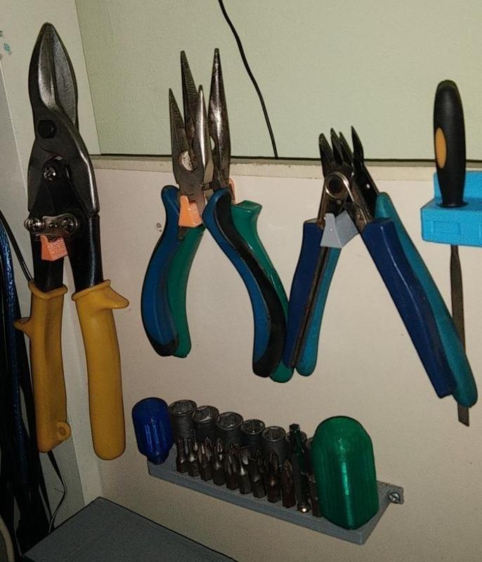 A Simple strong holder for cutting pliers nose pliers and cutters 