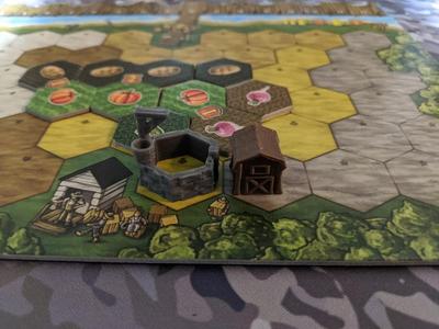 Riverboat Well Barn and first player token