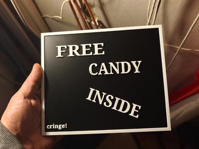 Free candy inside sign