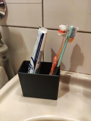 Toothbrush and toothpaste holder
