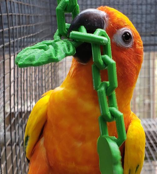 Small bird twist-in hanging chain toy with vine leaf charms